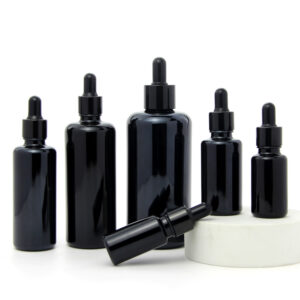 round black glass essential oil bottle with dropper