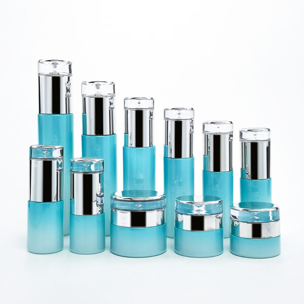 cylinder blue glass cosmetic bottle and jar