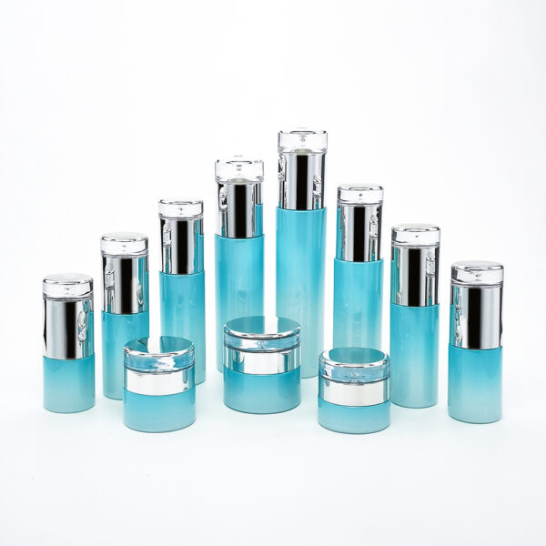 cylinder blue glass cosmetic bottle and jar