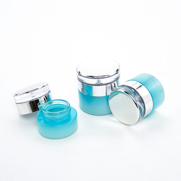 cylinder blue glass cosmetic bottle and jar