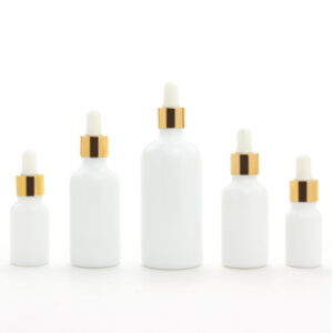 round white glass essential oil bottle with dropper