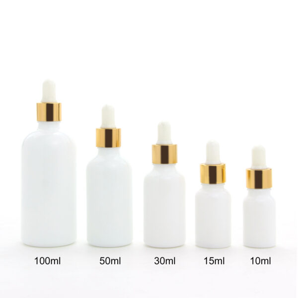 round white glass essential oil bottle with dropper