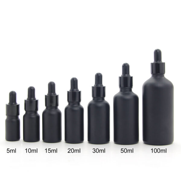 round matte black glass essential oil bottle with dropper