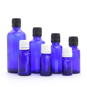 round blue glass essential oil bottle with orifice reducer and screw cap