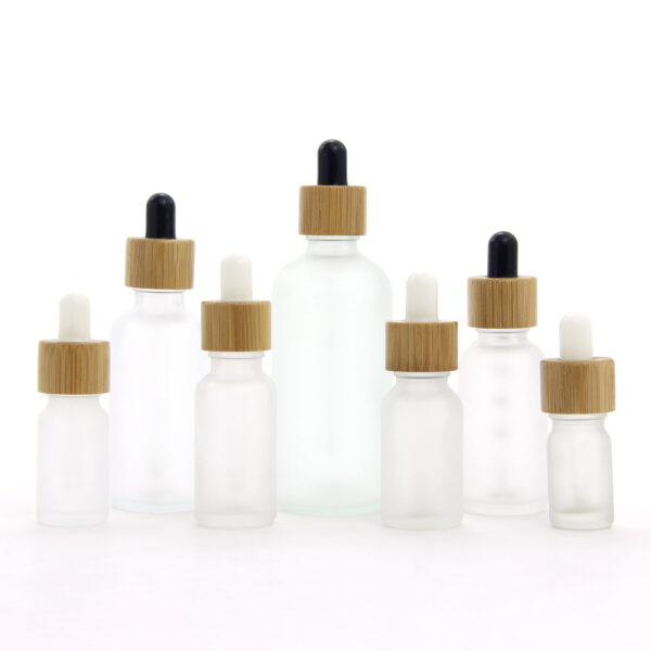 round frosted glass essential oil bottle with dropper