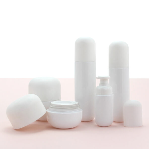 round white glass cosmetic bottle and jar