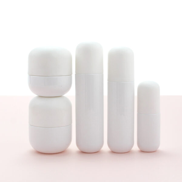 round white glass cosmetic bottle and jar