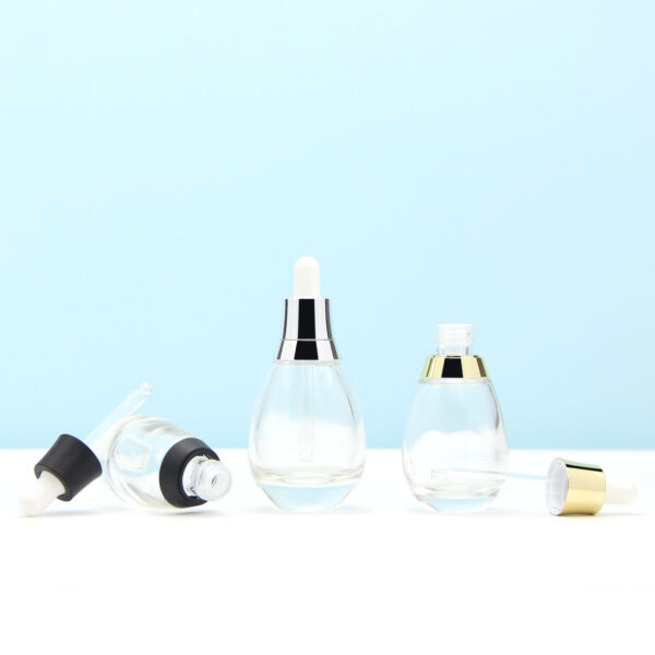 round clear glass serum dropper bottle